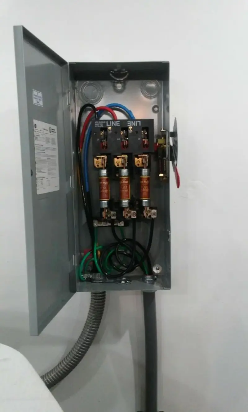 Three-phase disconnect switch installed for Smoke Detector Installation in Granville
